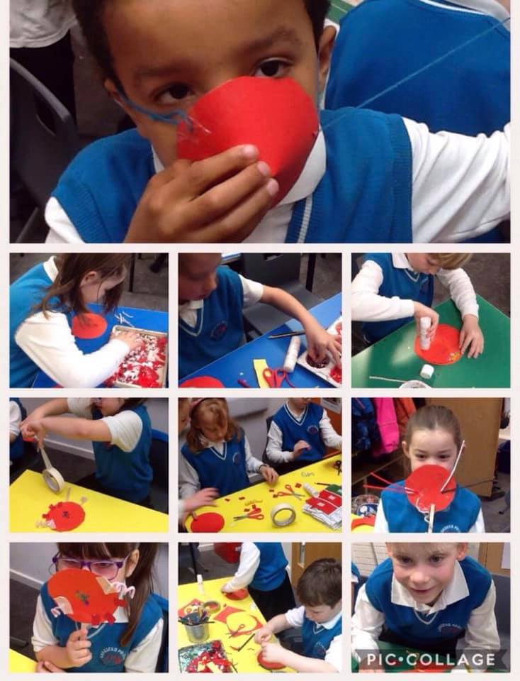 Children making their own red noses